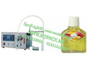 ماكينة نصف اتوماتيك لتعبئة زجاجات زيت الشعر برأس واحدة موديل إم تو باك 451 ماركة المهندس منسي