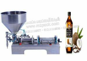 ماكينة تعبئة زجاجات زيت جوز الهند موديل 404 إم تو باك ماركة المهندس منسي