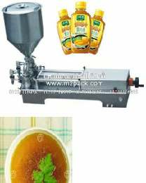ماكينة تعبئة زجاجات سائل مكسبات الطعم موديل 404 إم تو باك