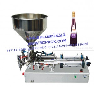 ماكينة تعبئة عصير التوت في زجاجات موديل ام تو باك 404 ماركة المهندس منسي